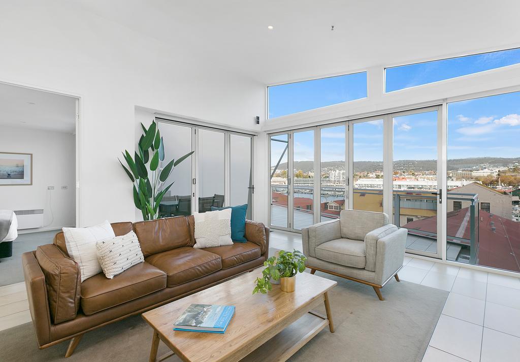 Sullivans Cove Apartments Hobart Extérieur photo A staged living room