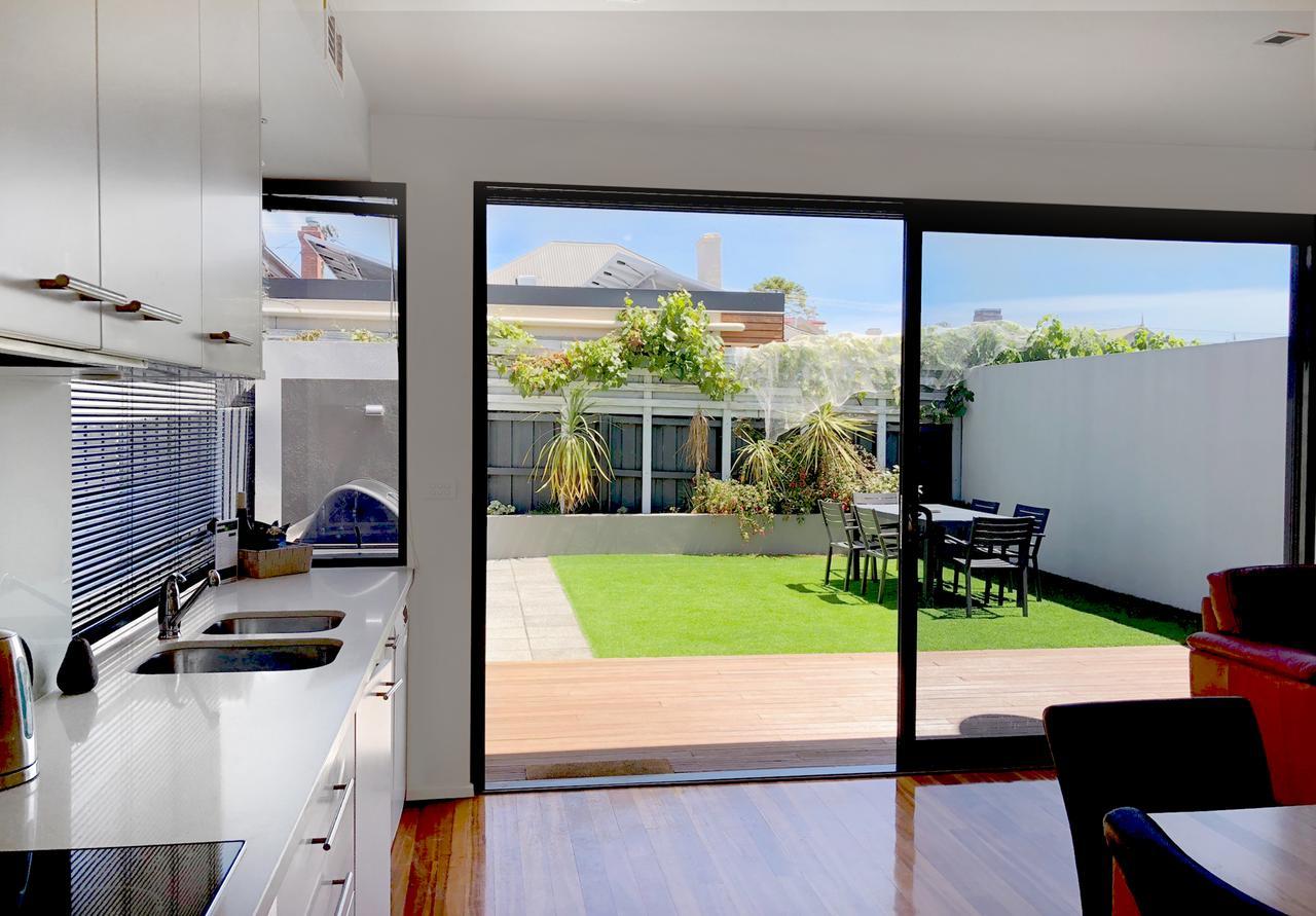 Sullivans Cove Apartments Hobart Extérieur photo A sliding door