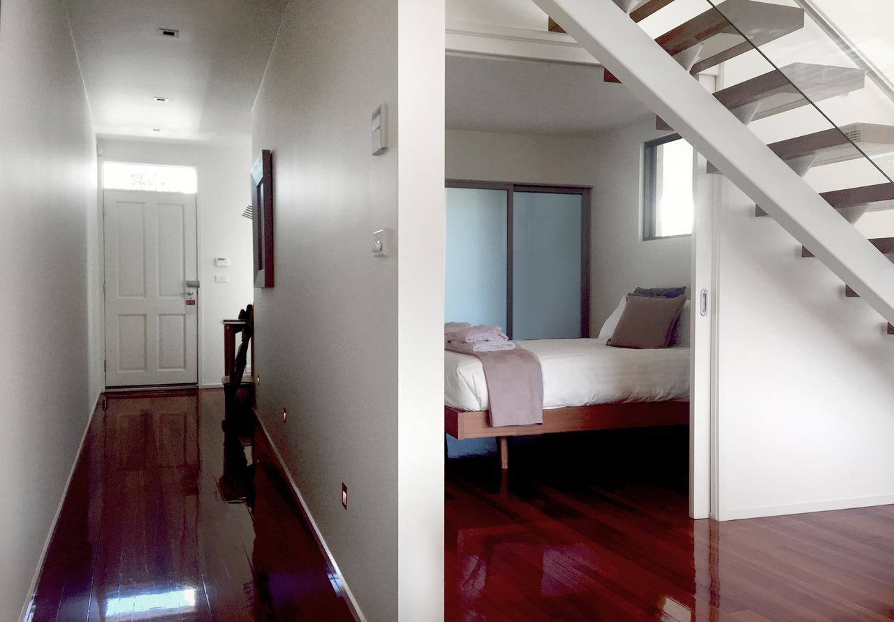 Sullivans Cove Apartments Hobart Extérieur photo A bedroom in a typical apartment